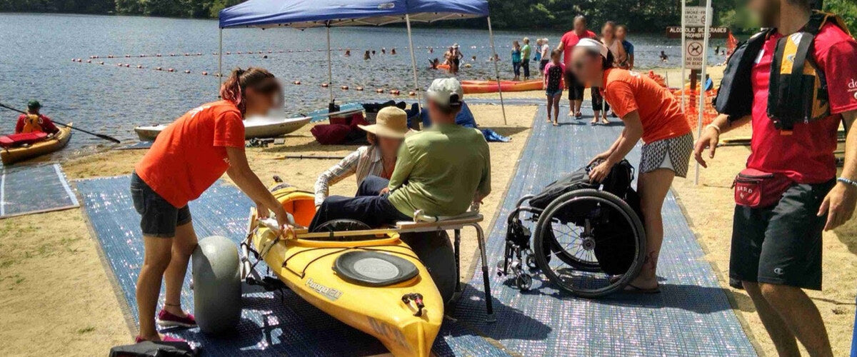 Accessible kayak launch using Mobi-mat beach access mat